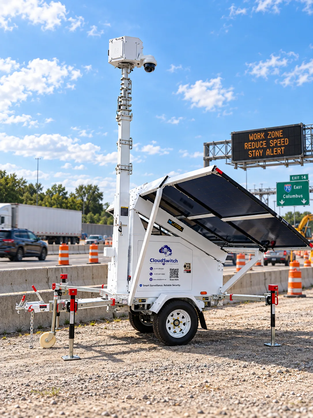 CloudSwitch solar-powered surveillance tower deployed beside an active highway work zone.